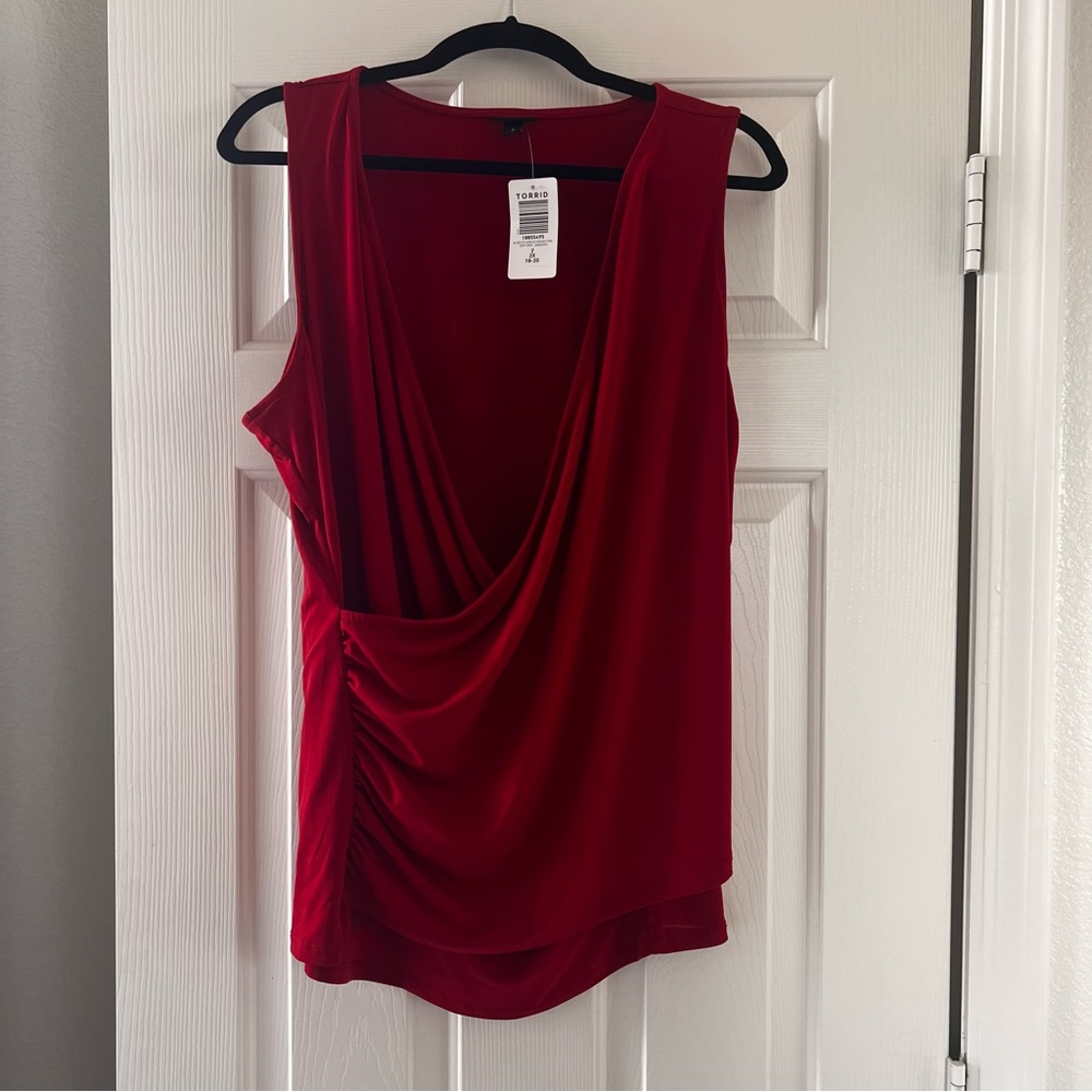 Torrid faux wrap sleeveless blouse. NWT